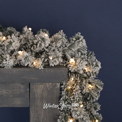 Хвойная гирлянда с лампочками Лапландия заснеженная 270*25 см, 96 теплых белых LED, на батарейках, ПВХ Winter Deco