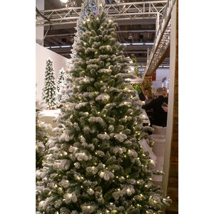 Искусственная елка с гирляндой Шеффилд заснеженная 198 см, 450 теплых белых ламп, ЛИТАЯ + ПВХ National Tree Company фото 2